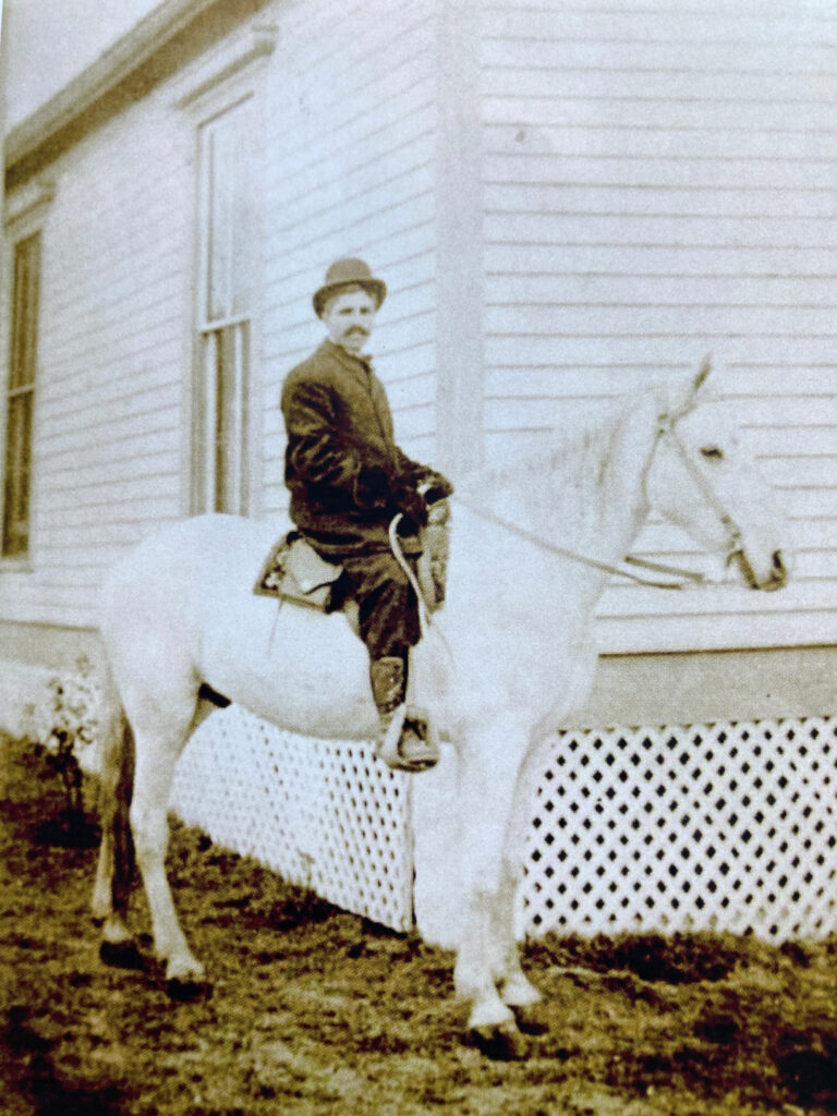 Great-grandfather making his rounds...on horseback!